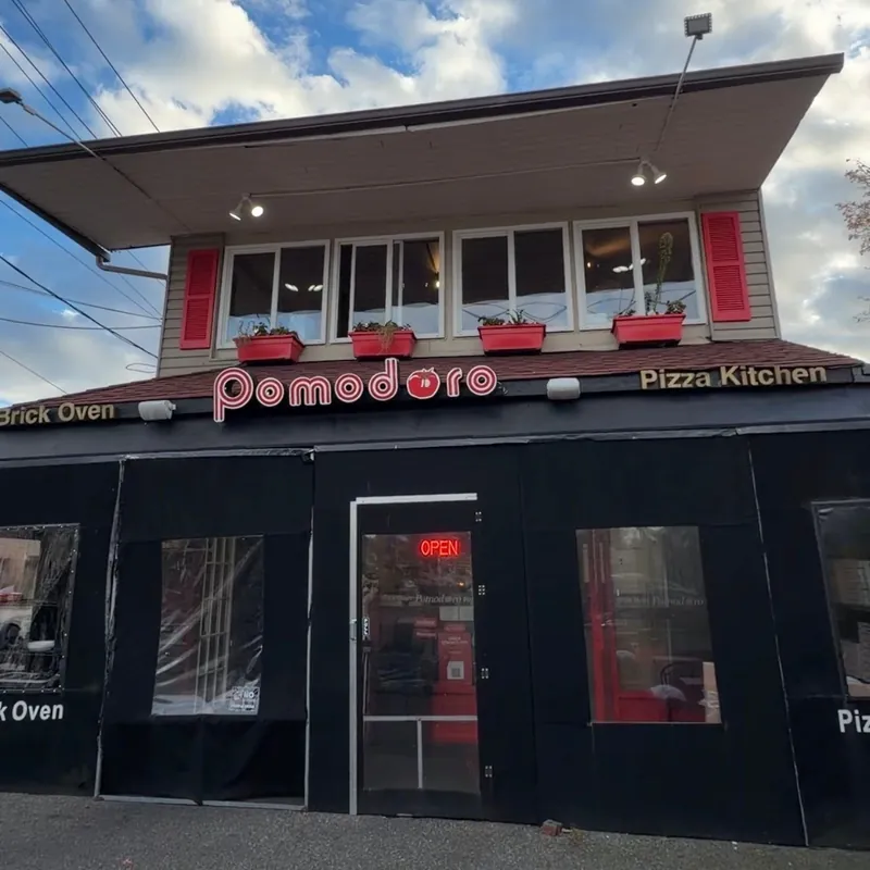 The Pomodoro storefront on Abbott Boulevard by day