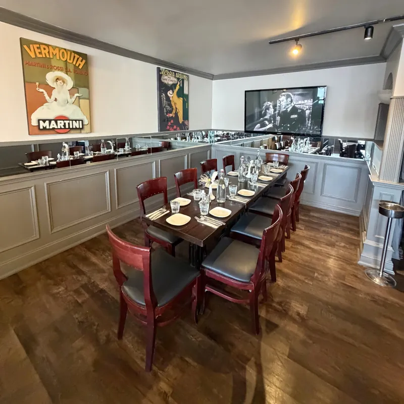 A long table set for a party in the dining room